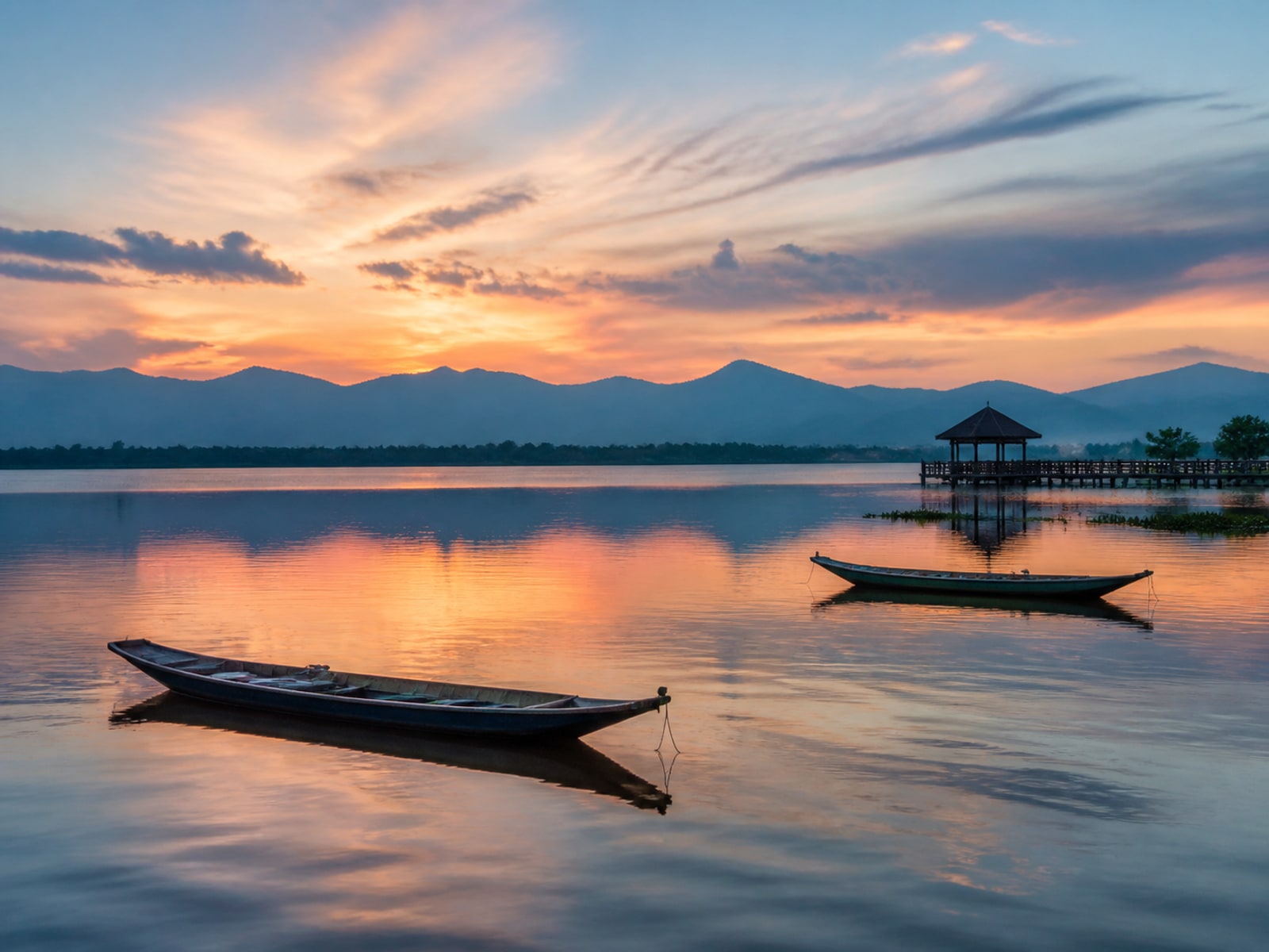 Editorial illustration of Kwan Phayao lake and the northern mountains